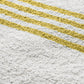 Handtuch aus Leinenfrotté Grund Reinweiss in Gelb im Detail