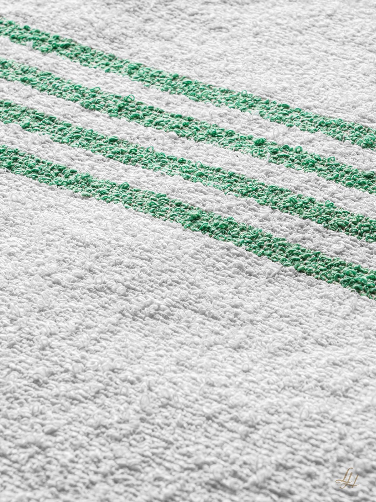 Handtuch aus Leinenfrotté Grund Reinweiss in Grün im Detail