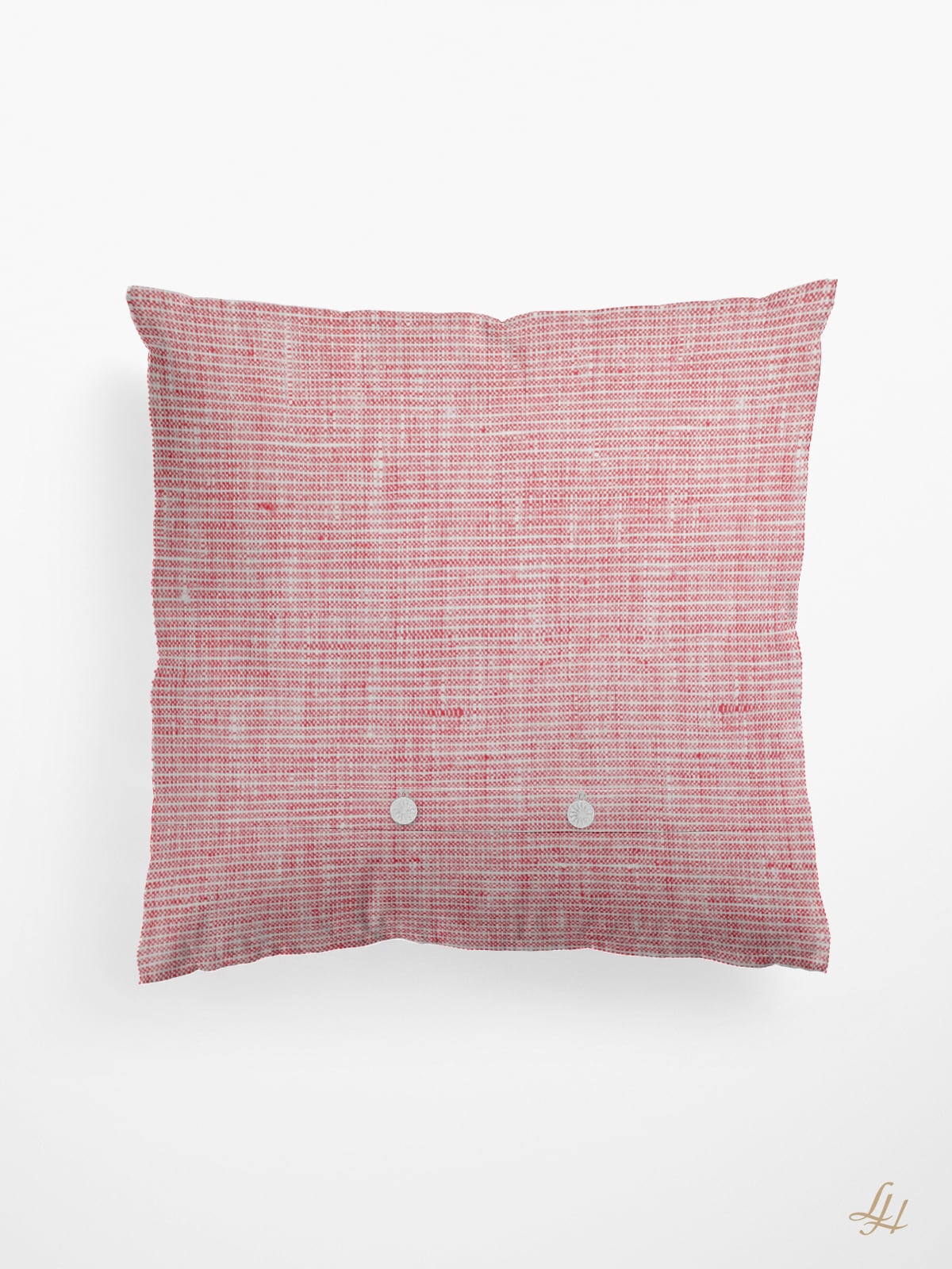 Quadratisches Zierkissen in traditioneller Webkunst, mit einem rosa-weißen Webmuster und zwei kleinen runden Knöpfen auf der Vorderseite.