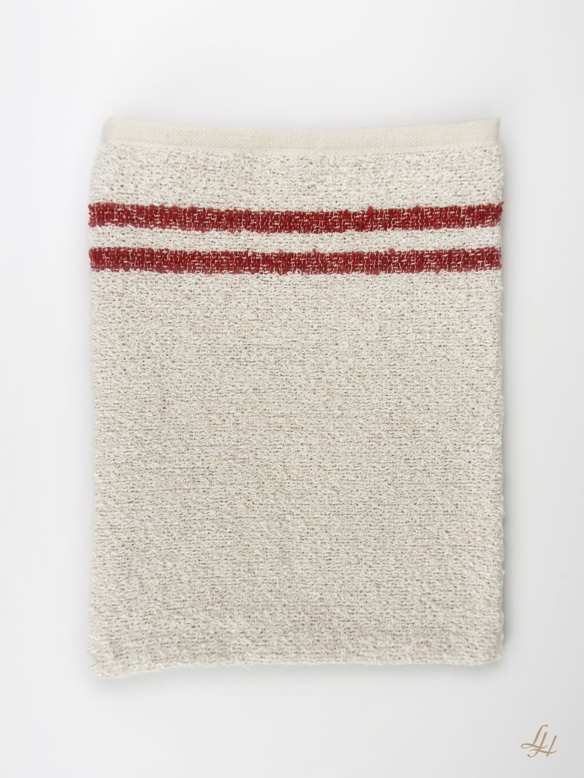 Waschhandschuh aus Leinenfrotté mit Grund Reinweiß in Rot Front