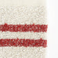 Waschhandschuh aus Leinenfrotté mit Grund Reinweiß in Rot Detail