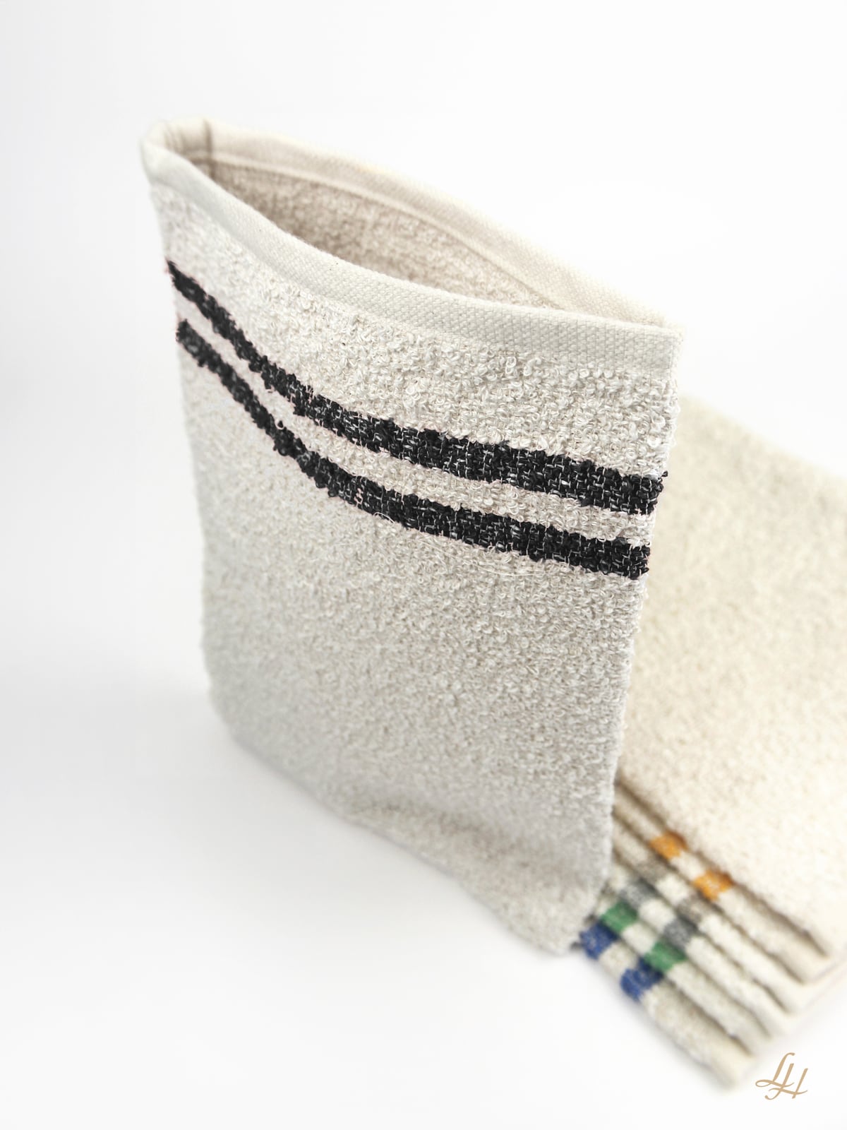 Waschhandschuh aus Leinenfrotté mit Grund Creme in Schwarz