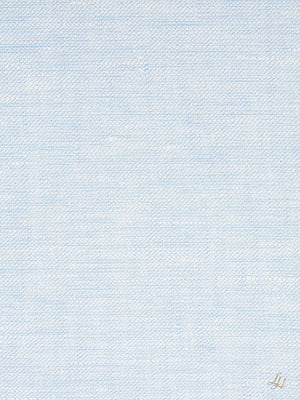 Himmelblauer strukturierter Stoff mit dezentem Webmuster; ein kleines goldenes L-Logo befindet sich in der rechten unteren Ecke.